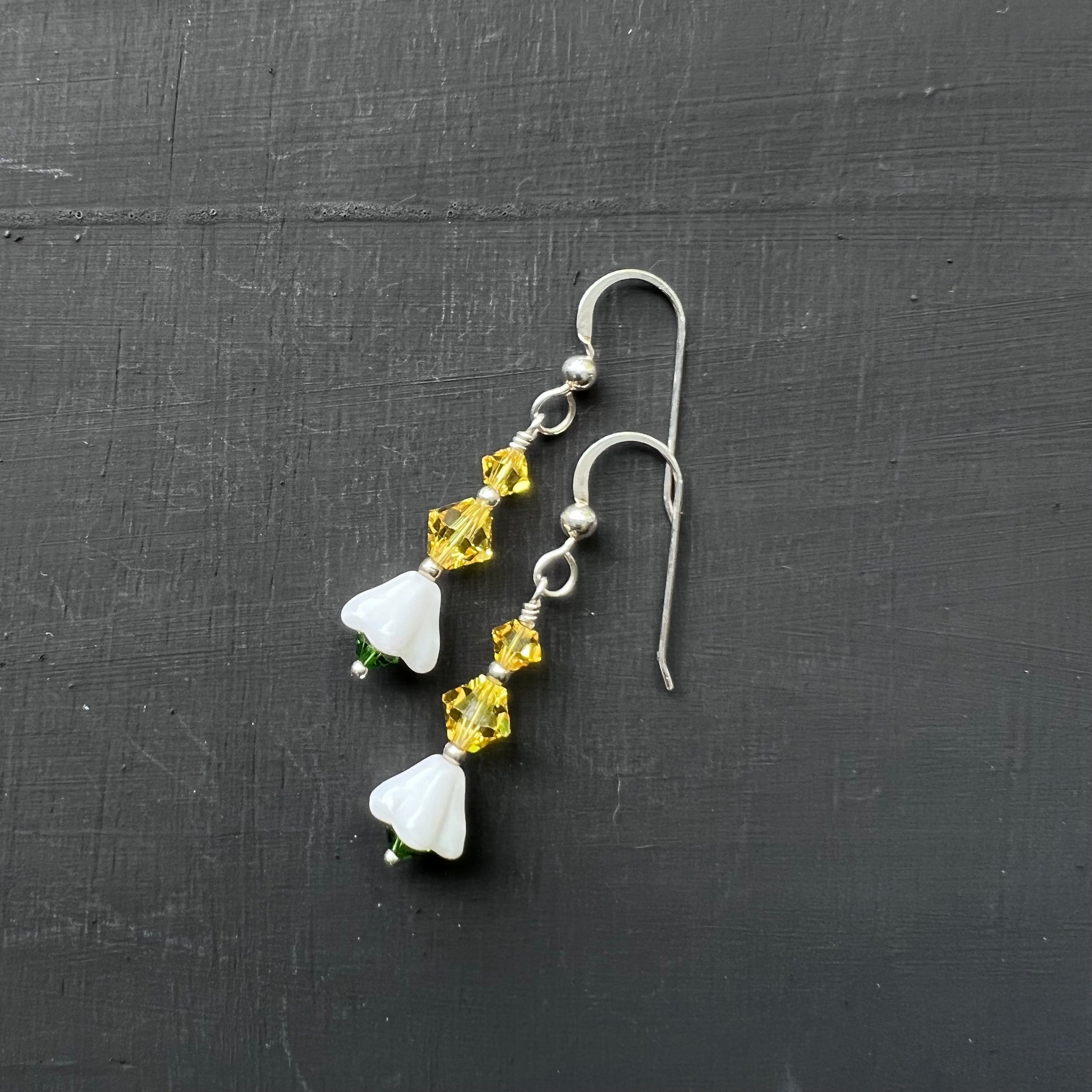Yellow, green, and white crystals and flowers earrings