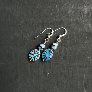 Blue glass ovals with black accents earrings