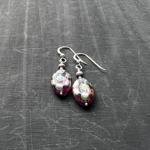Purple oval with peacock spots glass earrings