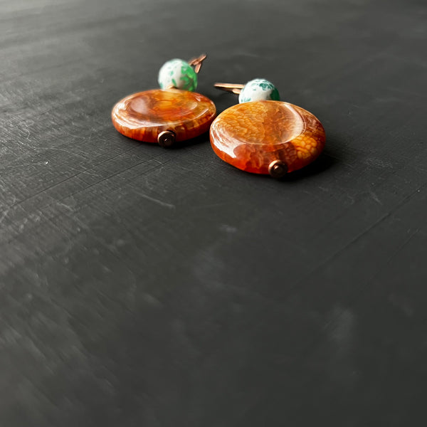 Orange and green stone on copper earrings