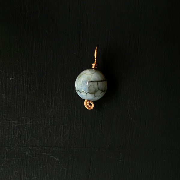 Faceted dyed agate round pendant on copper