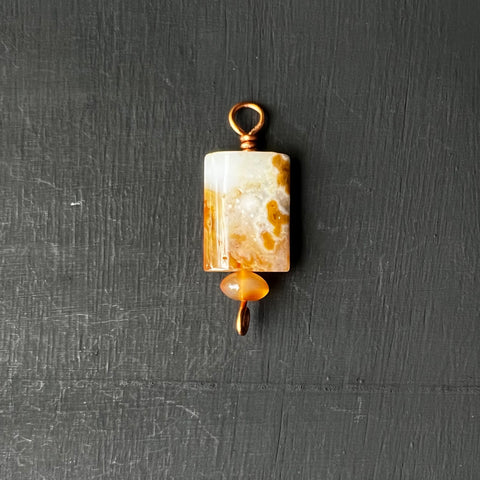 Agate pendant on copper